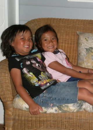 Kasen and Mia sitting on couch